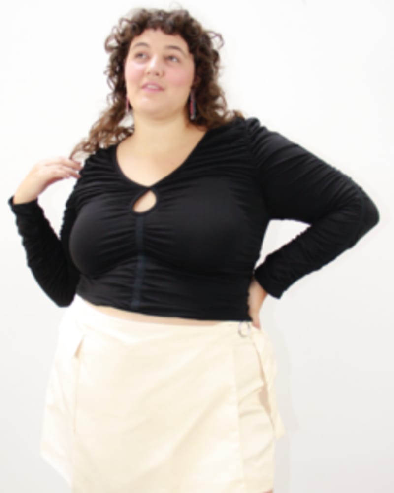 Front of a model wearing a size L Pucker Up Cutout Ruched Top in Black by Lovefool. | dia_product_style_image_id:249788